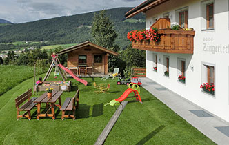 Playground and lawn for sunbathing at the farm